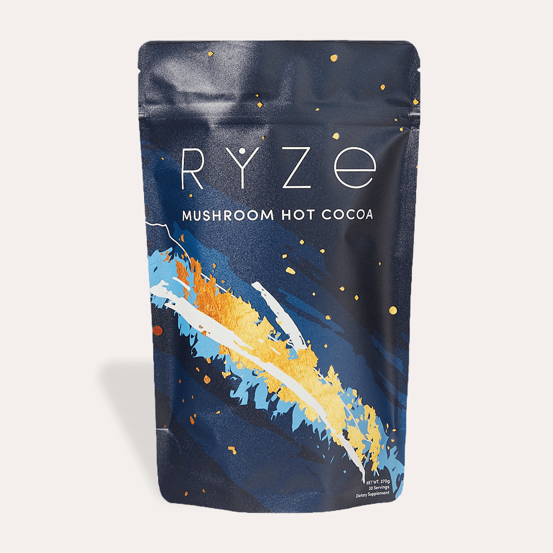 RYZE Mushroom Hot Cocoa bag, navy blue with colorful abstract splash design, on a white background